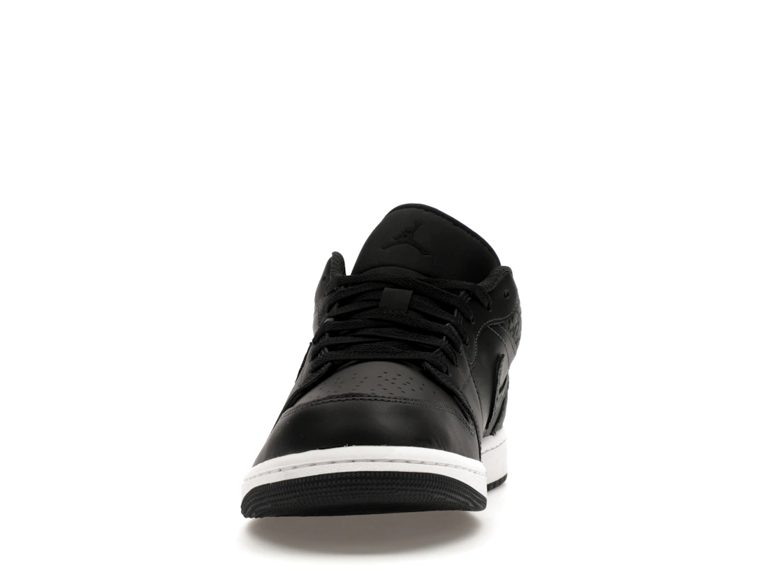 Vue 11 de Jordan 1 Low SE Black Elephant