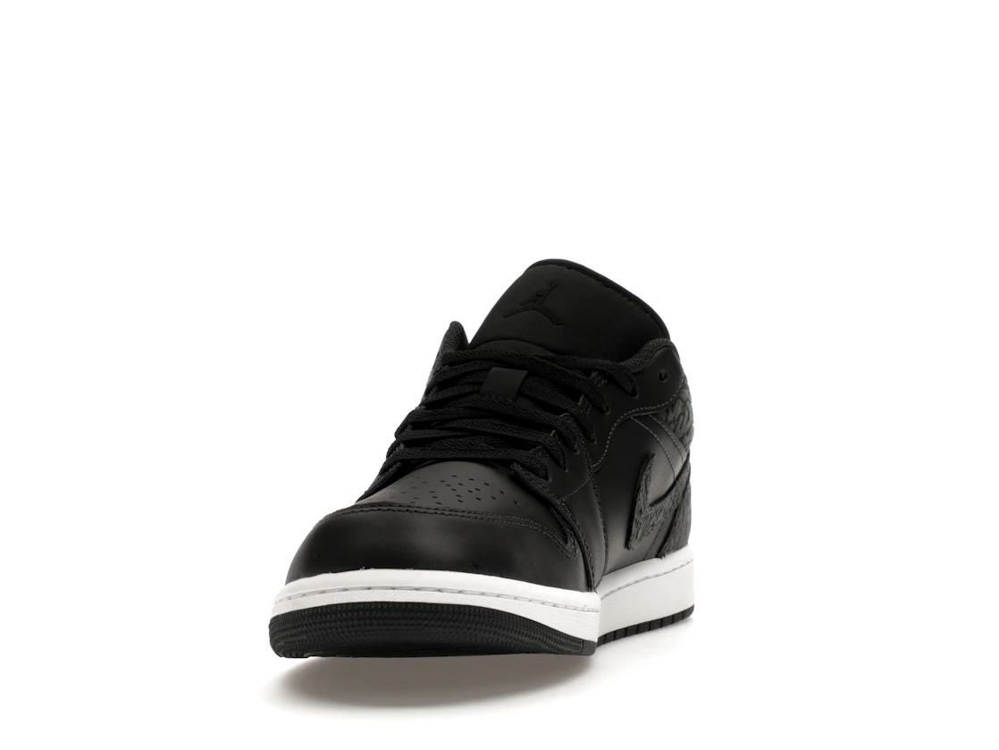 Vue 12 de Jordan 1 Low SE Black Elephant
