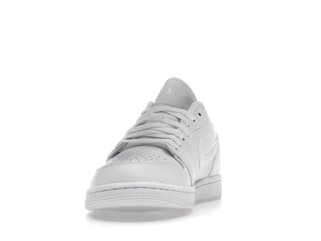 Vue 12 de Jordan 1 Low Triple White