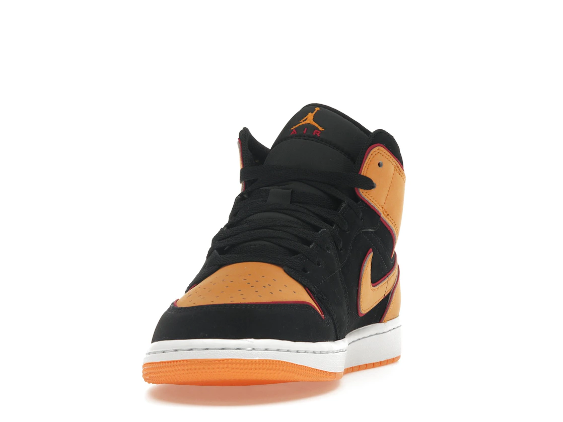 Vue 12 de Jordan 1 Mid Fat Tongue Black Orange