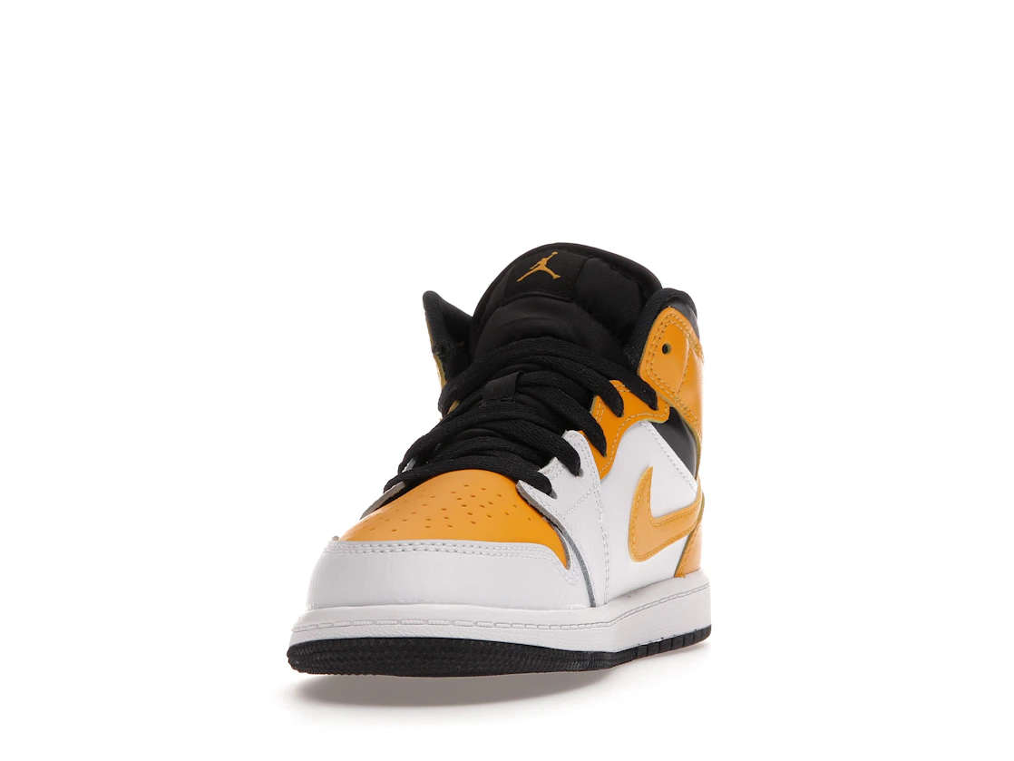 Vue 12 de Jordan 1 Mid University Gold (PS)