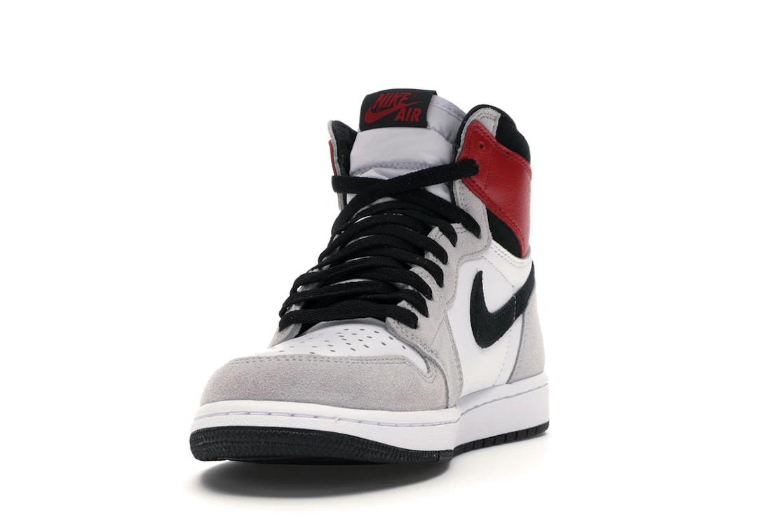 Vue 12 de Jordan 1 Retro High Light Smoke Grey