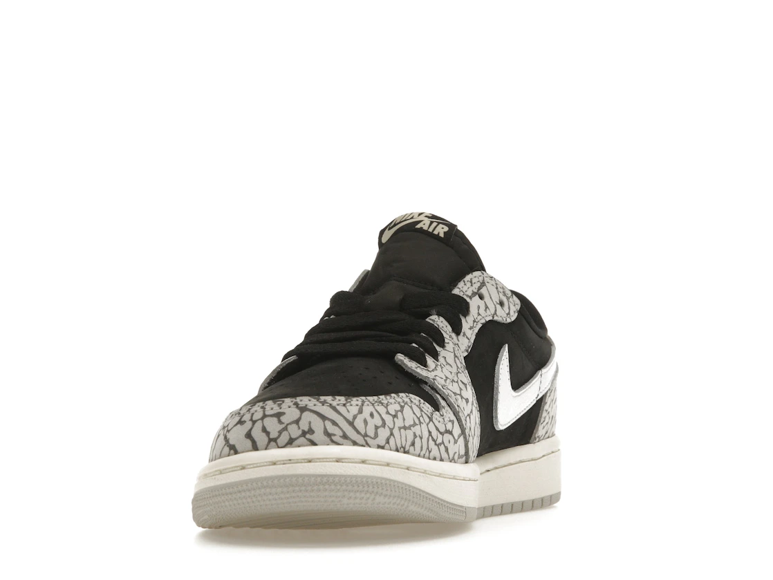 Vue 12 de Jordan 1 Retro Low OG Black Cement 