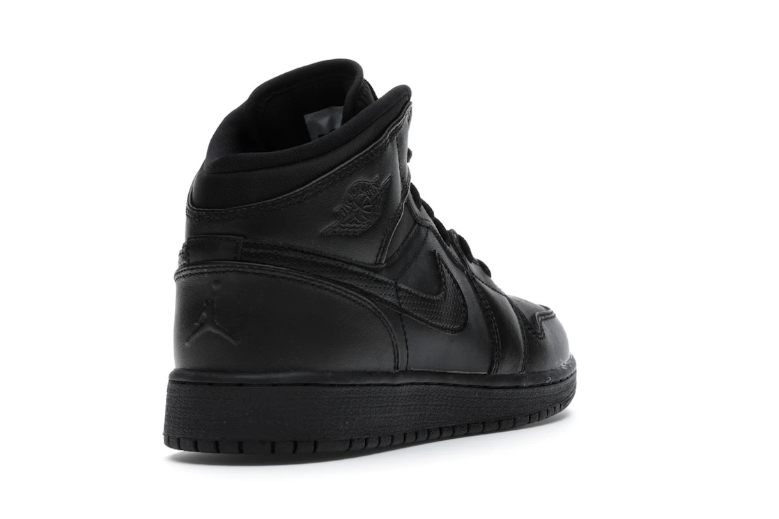 Vue 31 de Jordan 1 Retro Mid Black (2016) (GS)