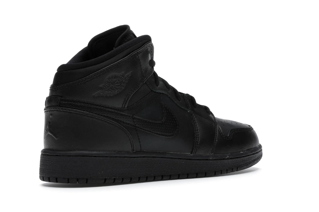 Vue 33 de Jordan 1 Retro Mid Black (2016) (GS)
