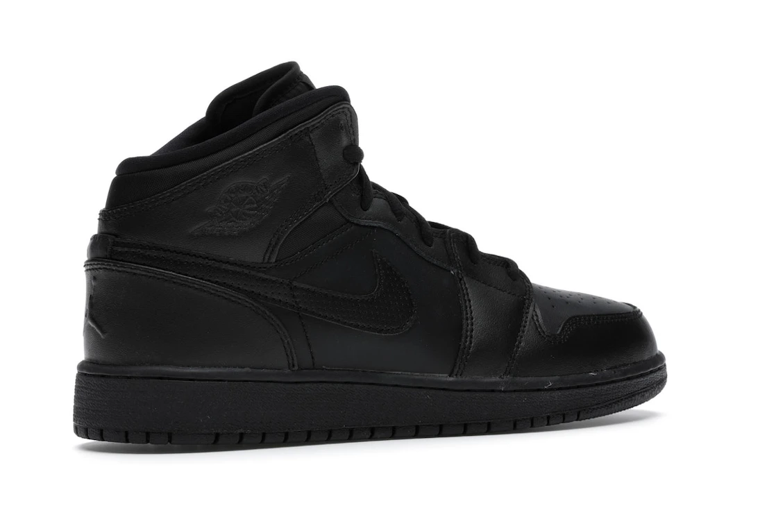 Vue 34 de Jordan 1 Retro Mid Black (2016) (GS)