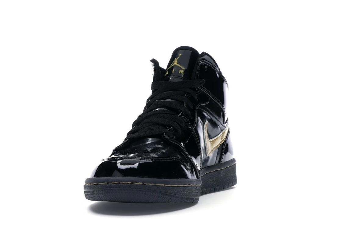 Vue 12 de Jordan 1 Retro Black Metallic Gold (2003)