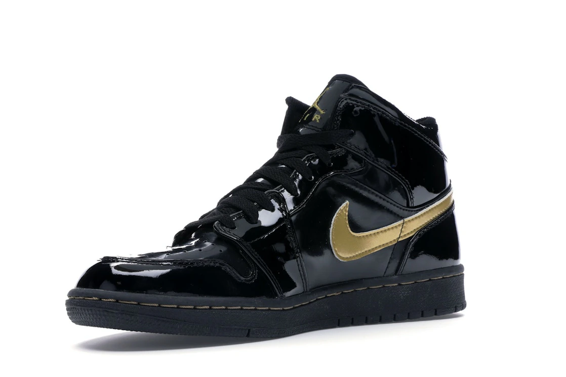 Vue 15 de Jordan 1 Retro Black Metallic Gold (2003)