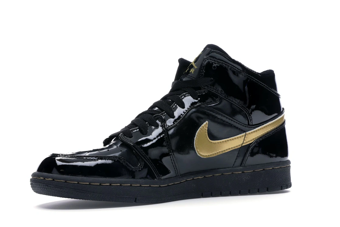 Vue 16 de Jordan 1 Retro Black Metallic Gold (2003)
