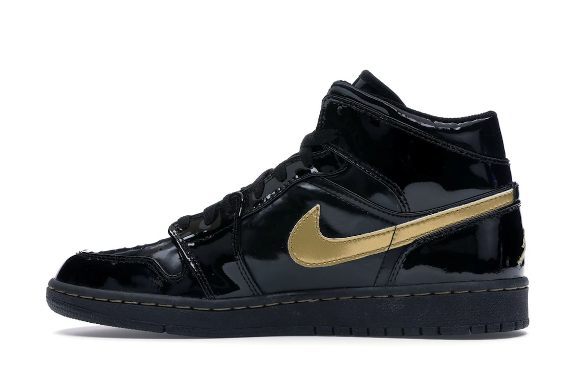 Vue 20 de Jordan 1 Retro Black Metallic Gold (2003)