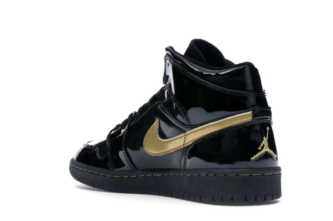 Vue 24 de Jordan 1 Retro Black Metallic Gold (2003)