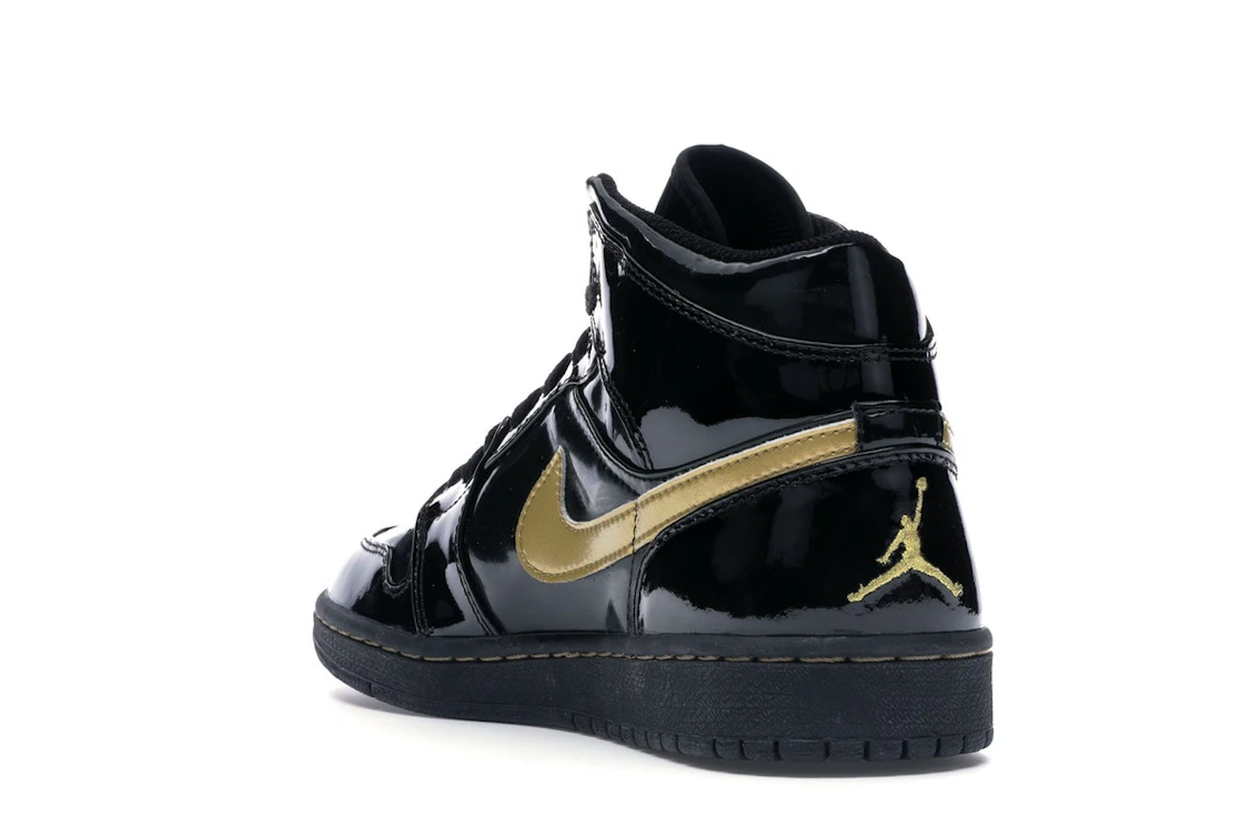Vue 25 de Jordan 1 Retro Black Metallic Gold (2003)