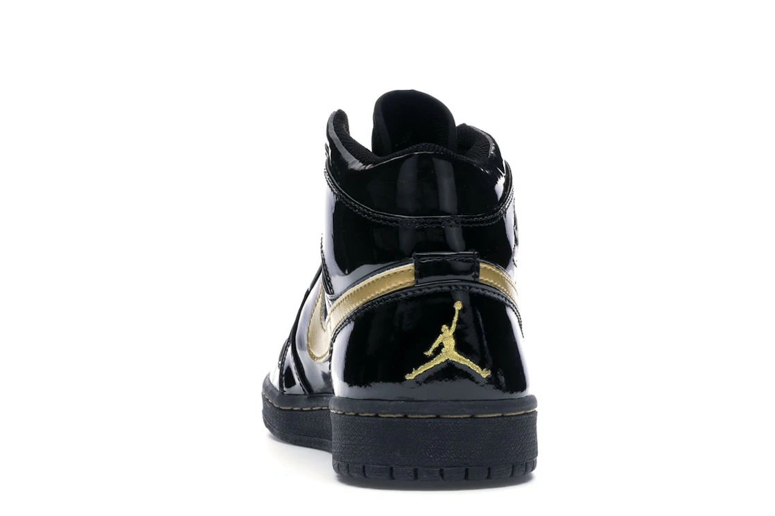 Vue 27 de Jordan 1 Retro Black Metallic Gold (2003)