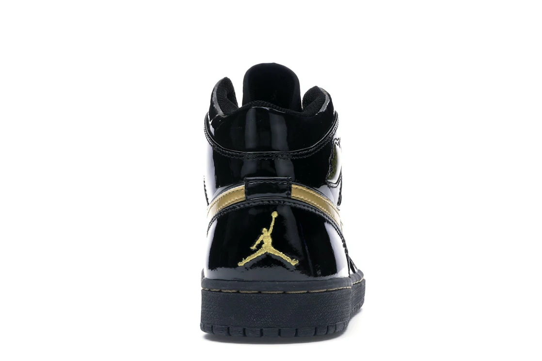 Vue 28 de Jordan 1 Retro Black Metallic Gold (2003)