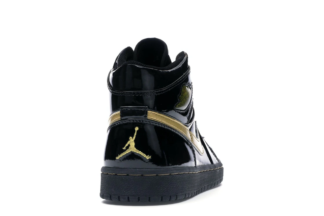 Vue 29 de Jordan 1 Retro Black Metallic Gold (2003)
