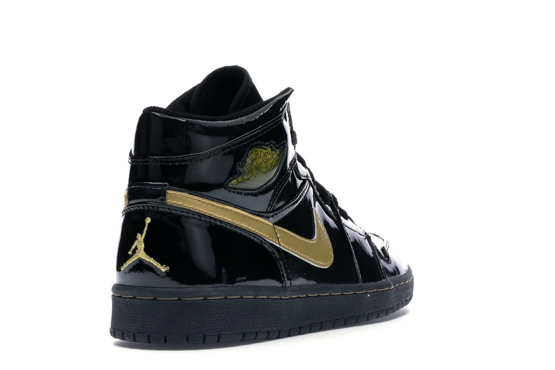 Vue 31 de Jordan 1 Retro Black Metallic Gold (2003)