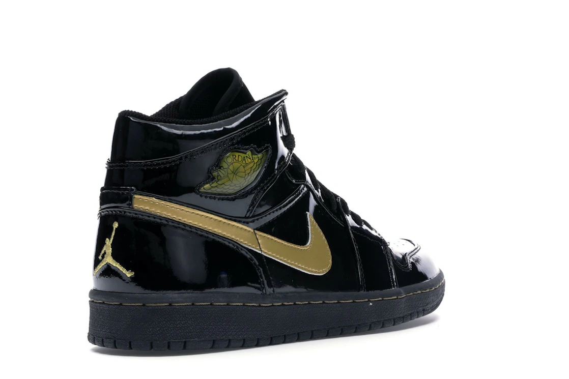 Vue 32 de Jordan 1 Retro Black Metallic Gold (2003)