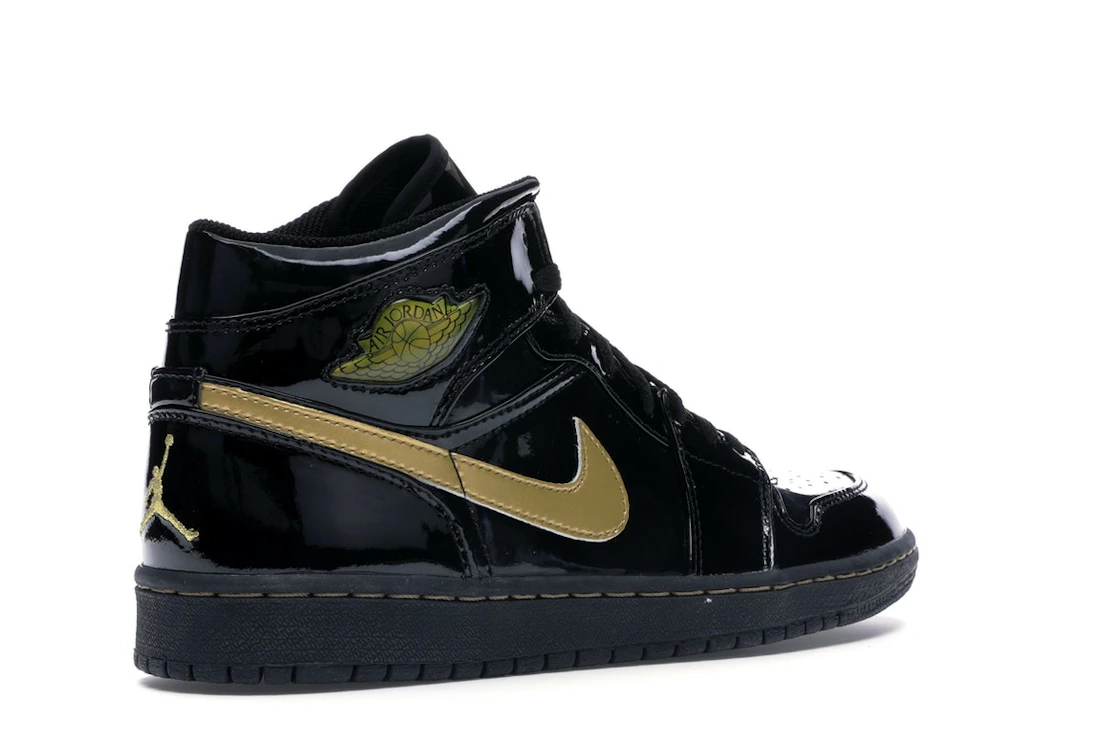 Vue 33 de Jordan 1 Retro Black Metallic Gold (2003)