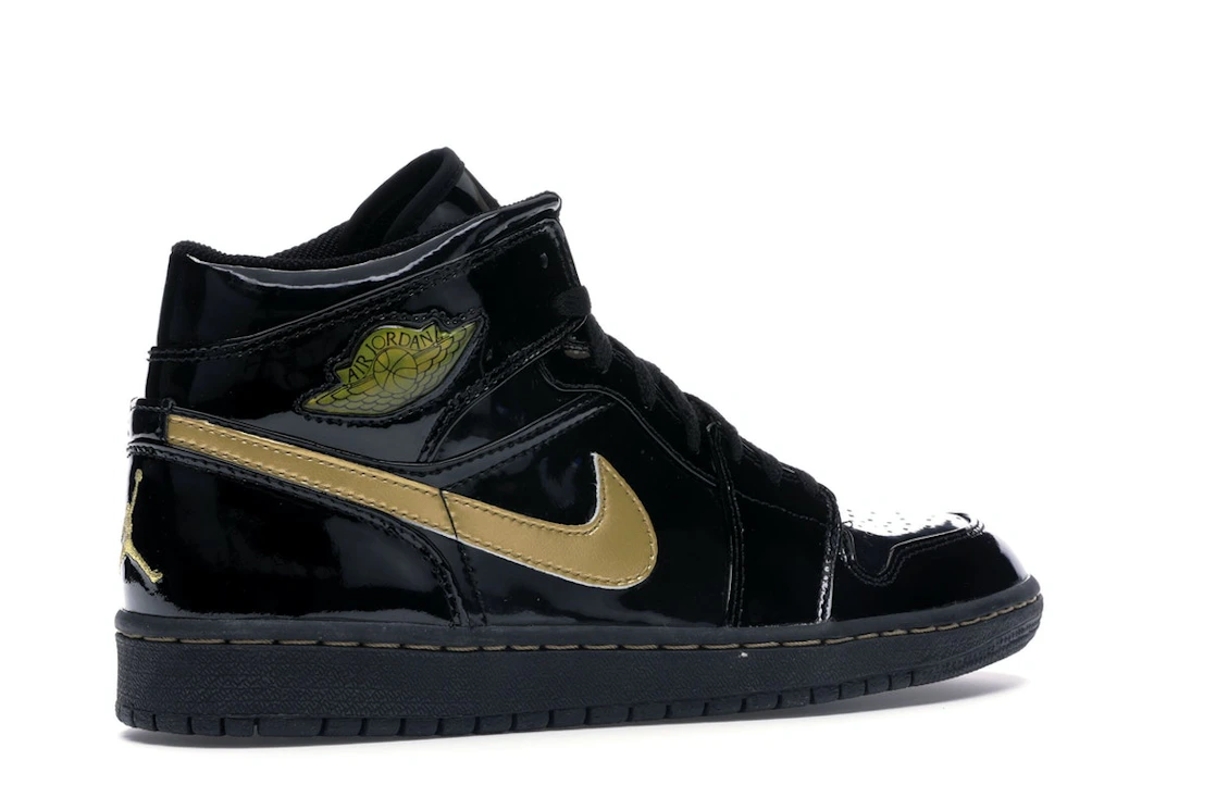 Vue 34 de Jordan 1 Retro Black Metallic Gold (2003)