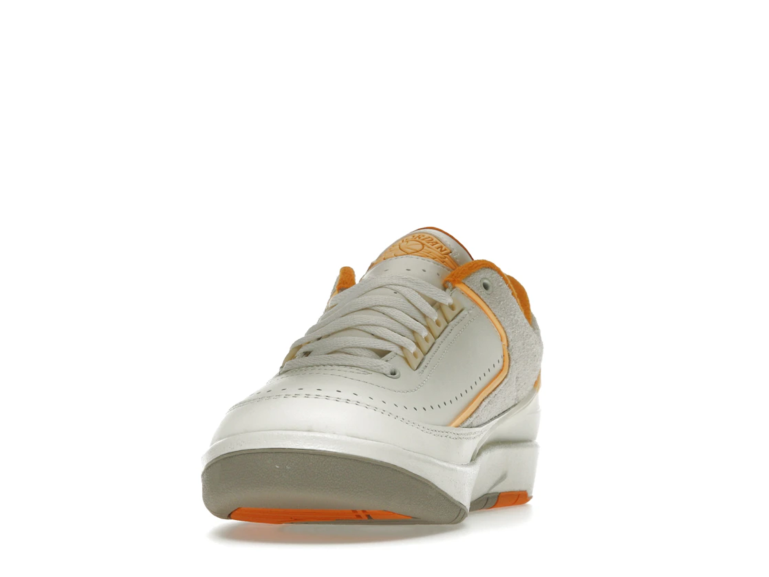 Vue 12 de Jordan 2 Retro Low Craft Melon Tint