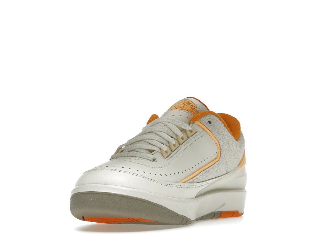 Vue 13 de Jordan 2 Retro Low Craft Melon Tint