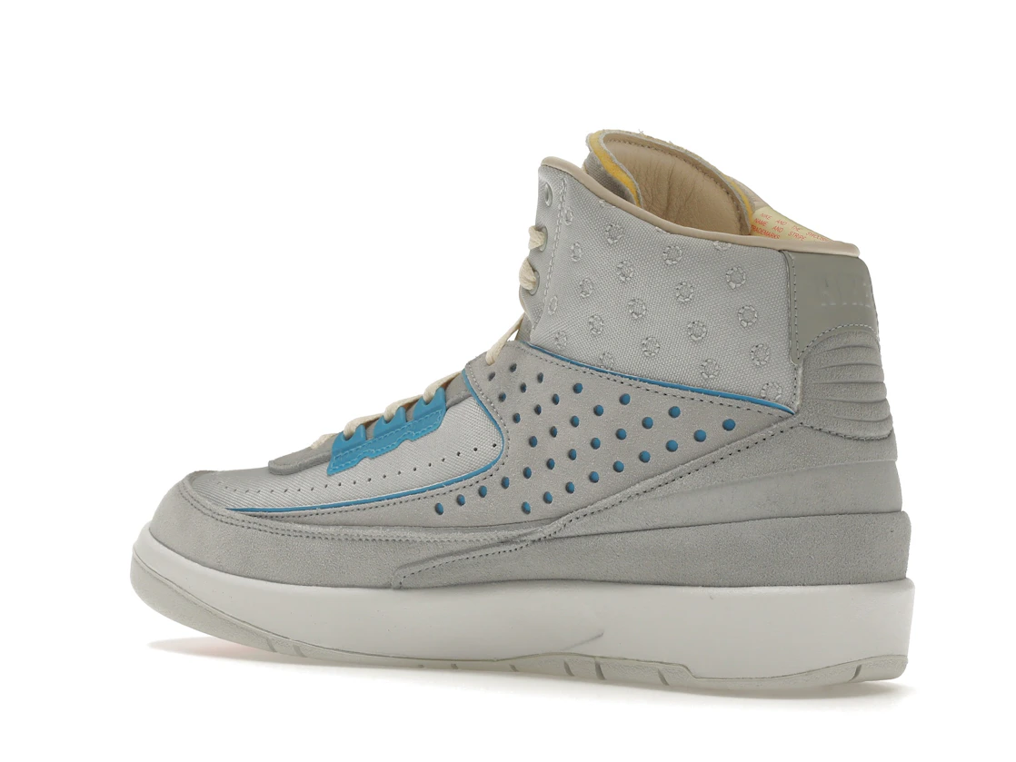 Vue 23 de Jordan 2 Retro SP Union Grey Fog