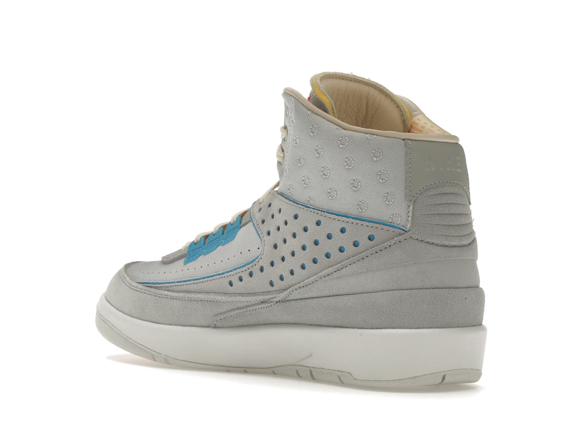 Vue 24 de Jordan 2 Retro SP Union Grey Fog