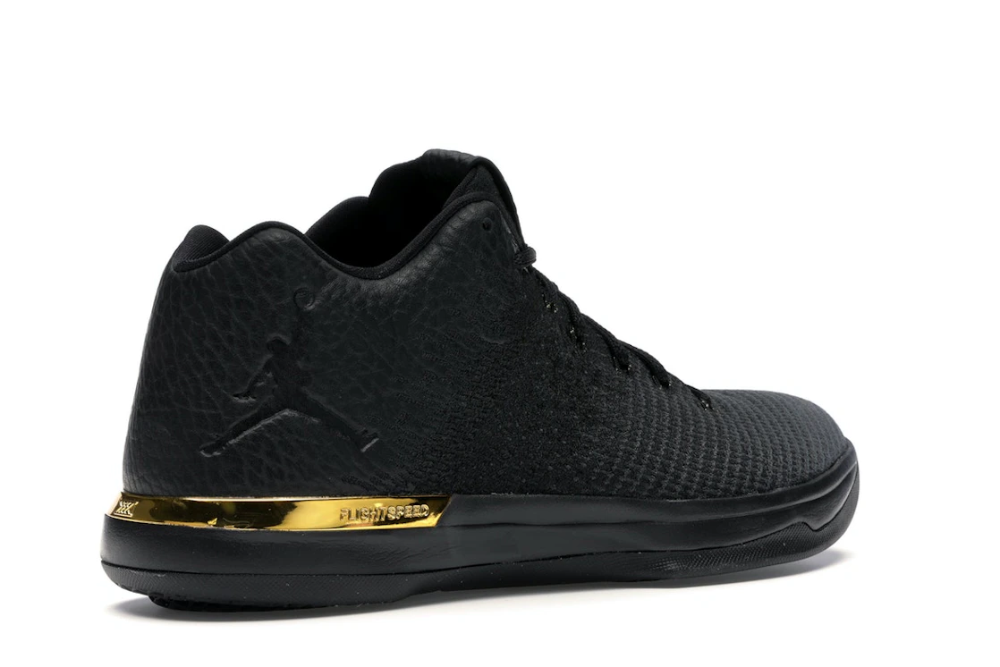 Vue 33 de Jordan XXX1 Low Black Gold