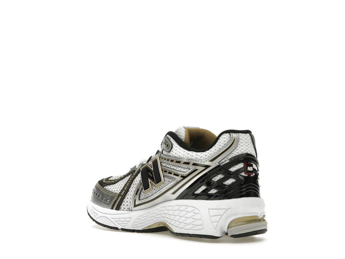 Vue 24 de New Balance 1906R White Metallic Gold (GS)