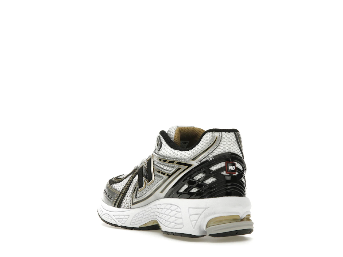 Vue 25 de New Balance 1906R White Metallic Gold (GS)