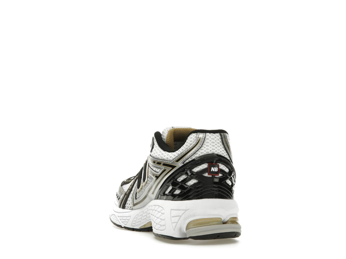 Vue 26 de New Balance 1906R White Metallic Gold (GS)
