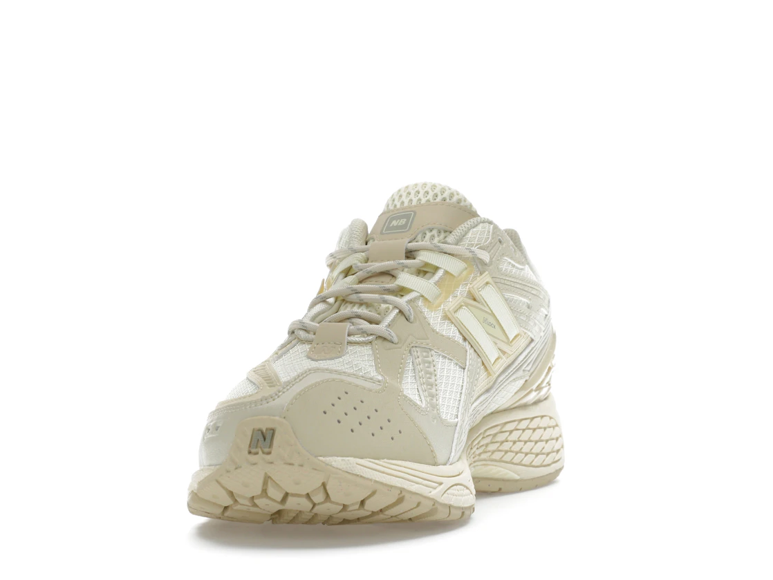 Vue 12 de New Balance 1906U Butter Yellow