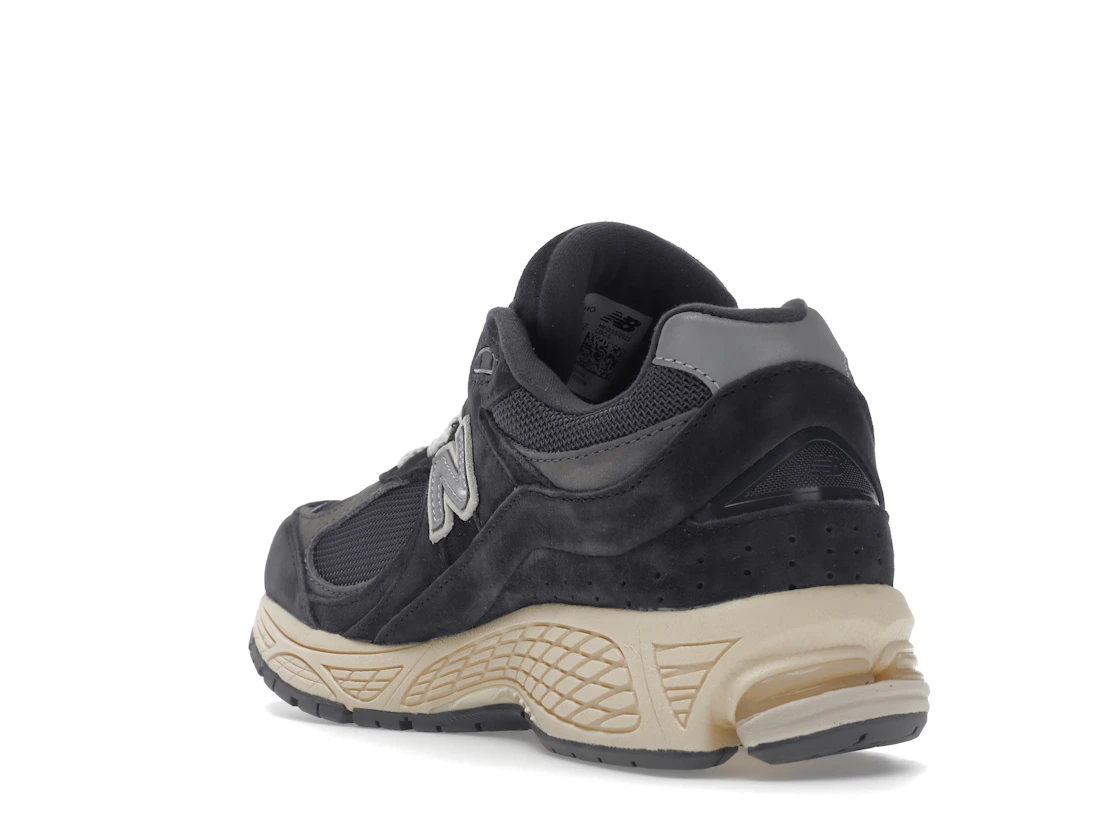 Vue 25 de New Balance 2002R Black Dark Grey