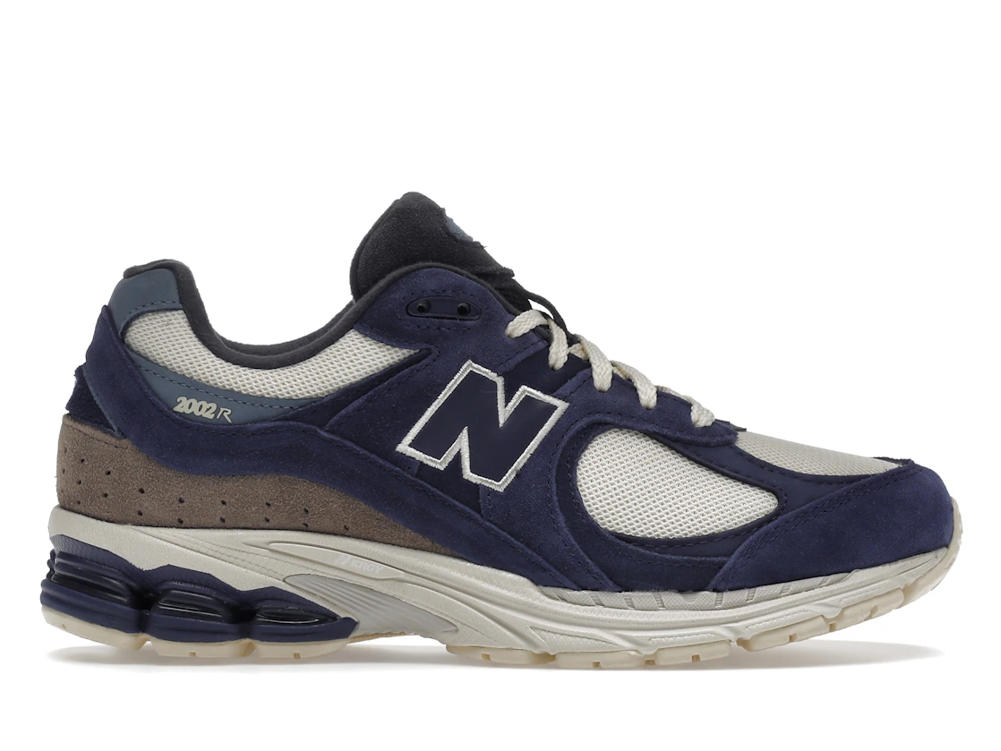 Vue 1 de New Balance 2002R Light Cream Purple