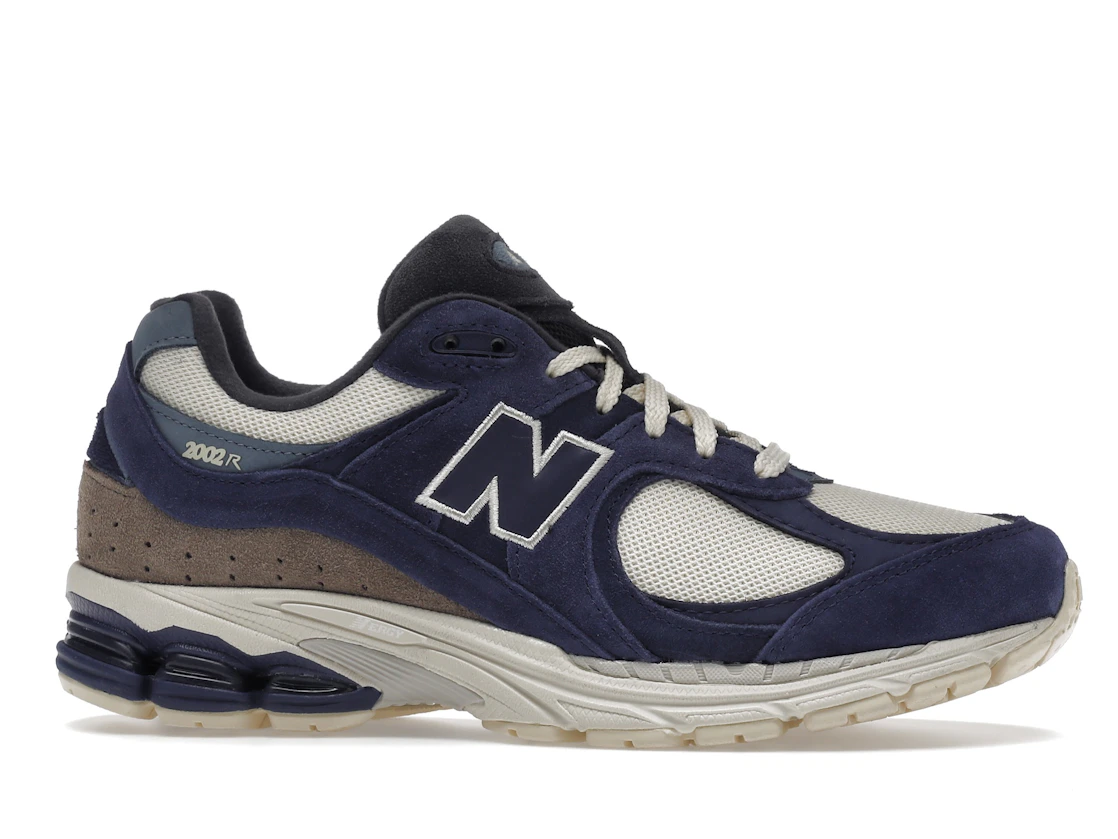 Vue 2 de New Balance 2002R Light Cream Purple