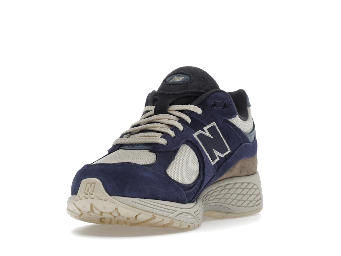 Vue 13 de New Balance 2002R Light Cream Purple