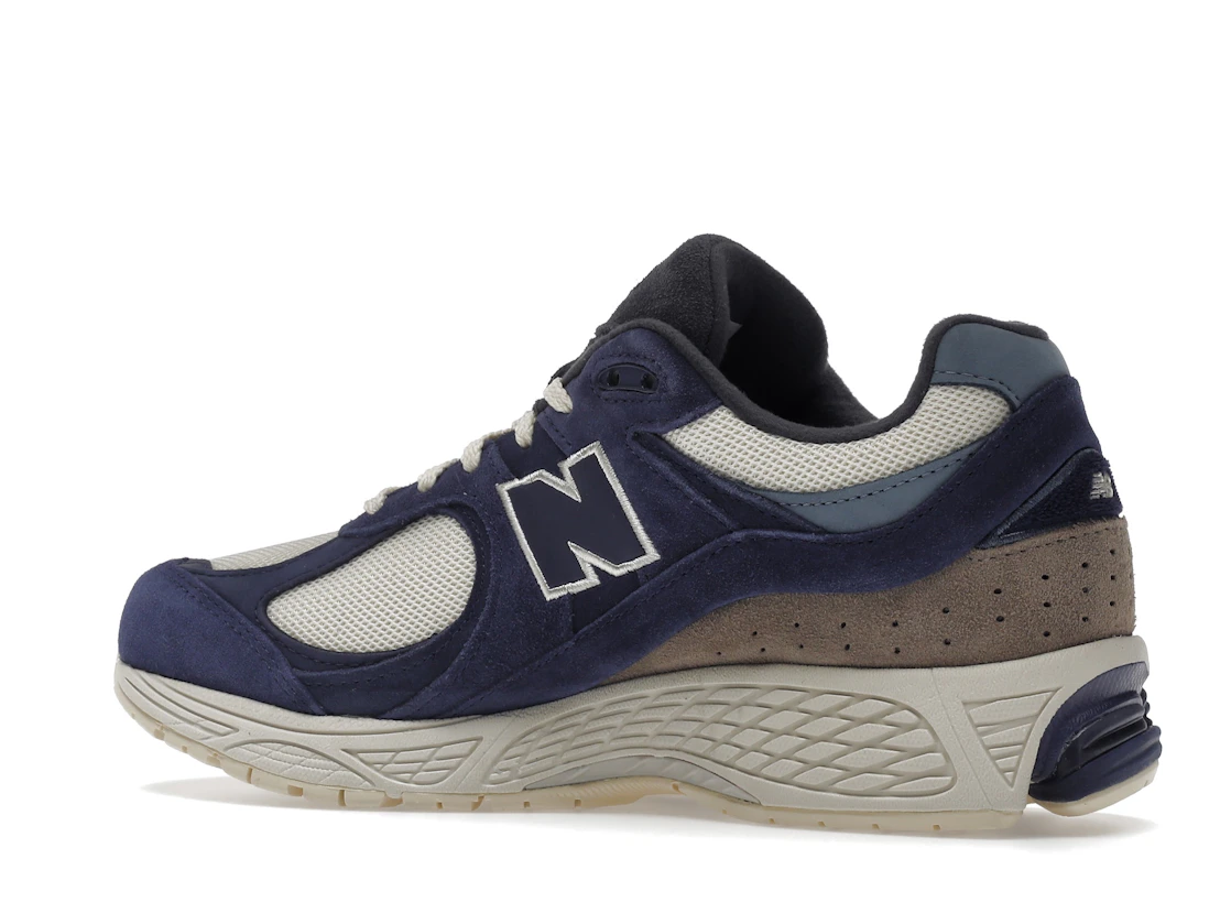 Vue 22 de New Balance 2002R Light Cream Purple