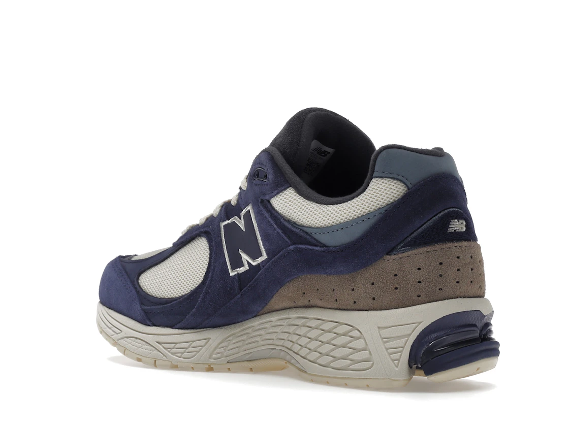 Vue 24 de New Balance 2002R Light Cream Purple