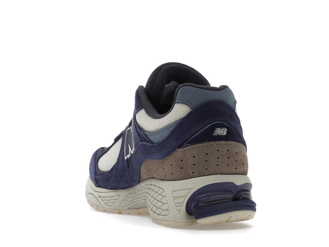 Vue 26 de New Balance 2002R Light Cream Purple