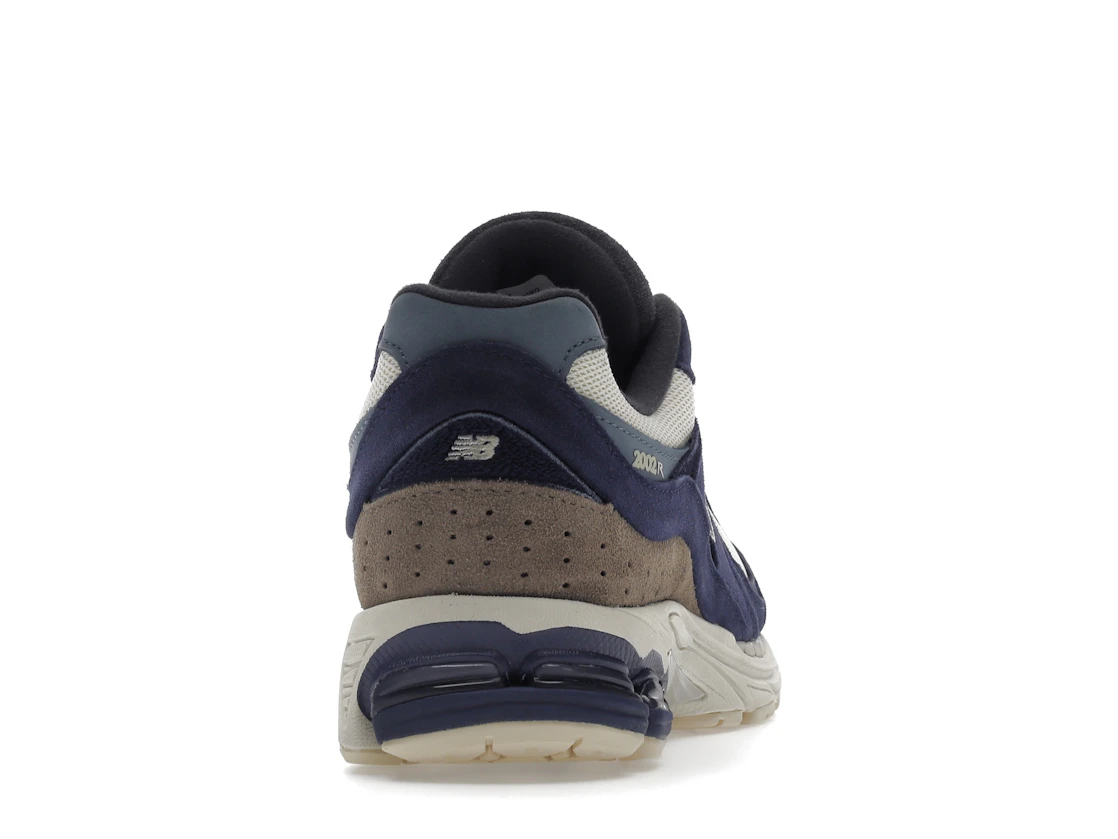 Vue 29 de New Balance 2002R Light Cream Purple