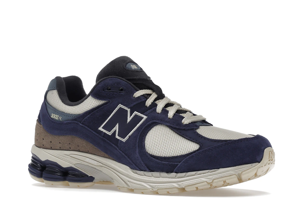 Vue 4 de New Balance 2002R Light Cream Purple