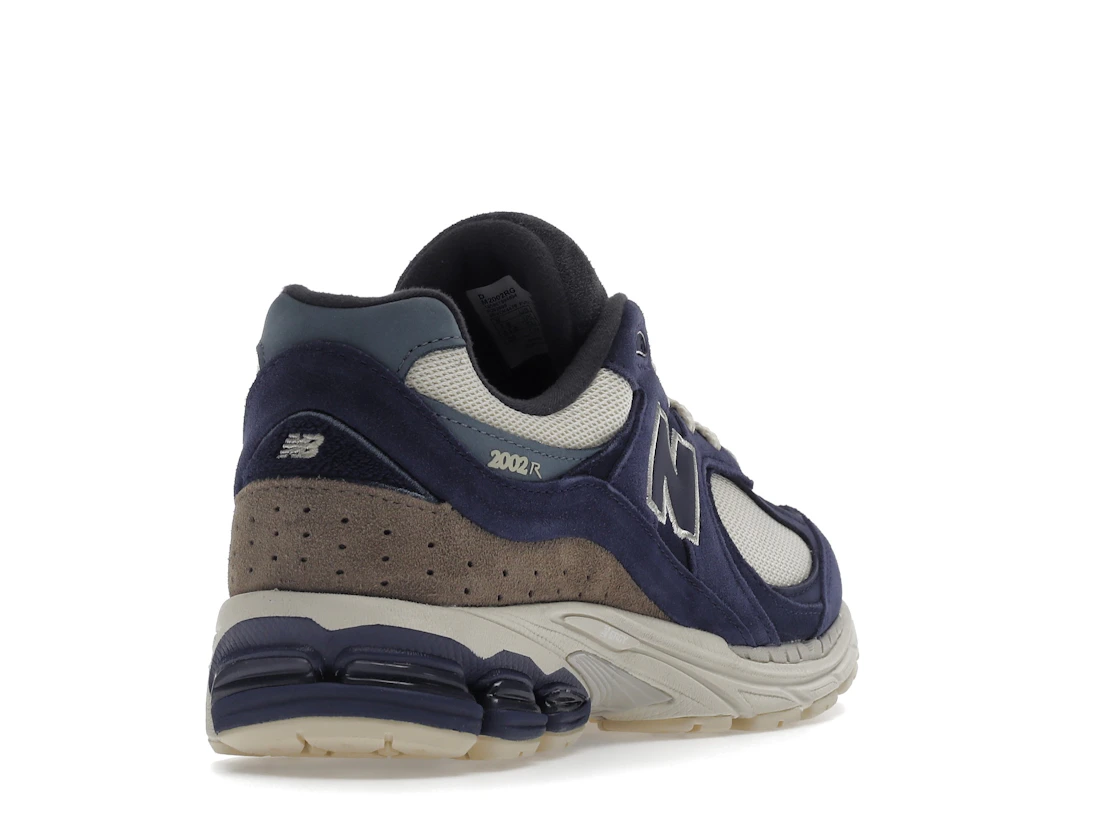 Vue 31 de New Balance 2002R Light Cream Purple