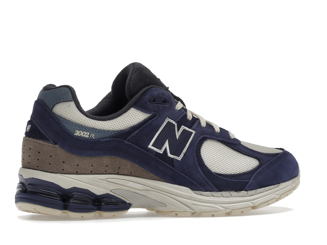 Vue 35 de New Balance 2002R Light Cream Purple