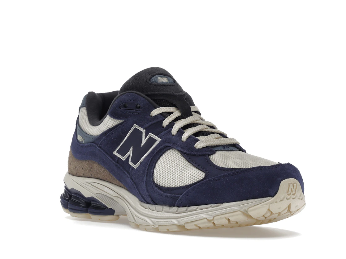 Vue 6 de New Balance 2002R Light Cream Purple