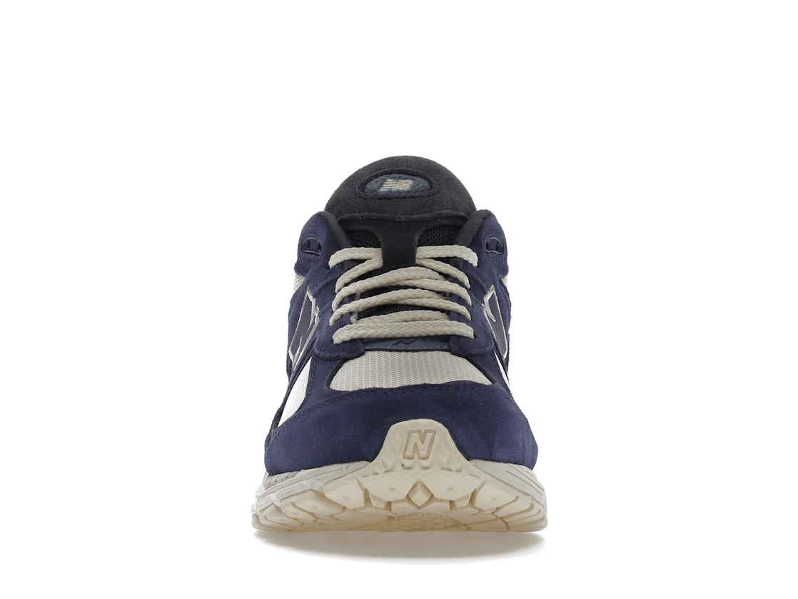 Vue 10 de New Balance 2002R Light Cream Purple