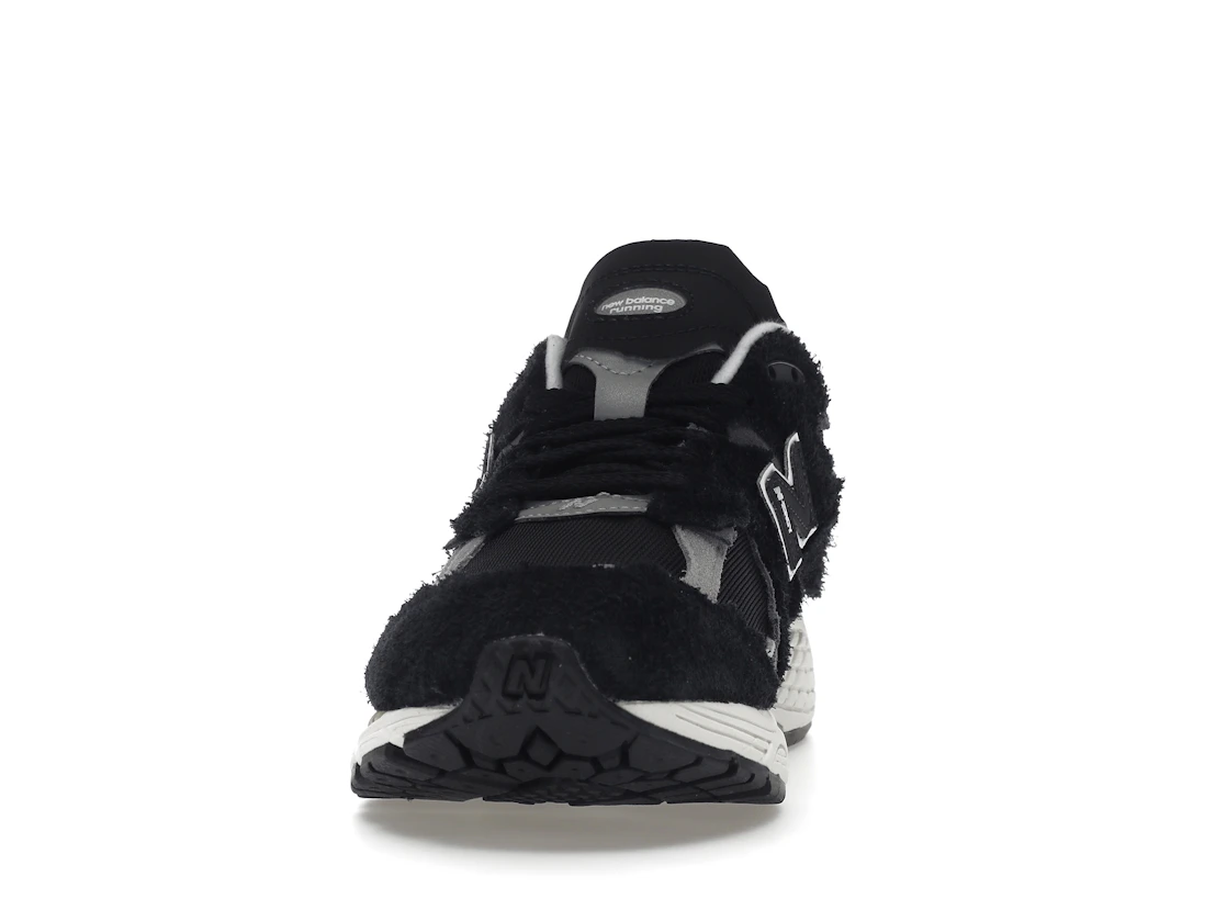 Vue 11 de New Balance 2002R Protection Pack Black Grey
