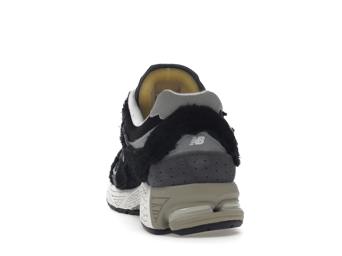 Vue 27 de New Balance 2002R Protection Pack Black Grey