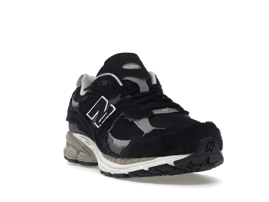 Vue 7 de New Balance 2002R Protection Pack Black Grey