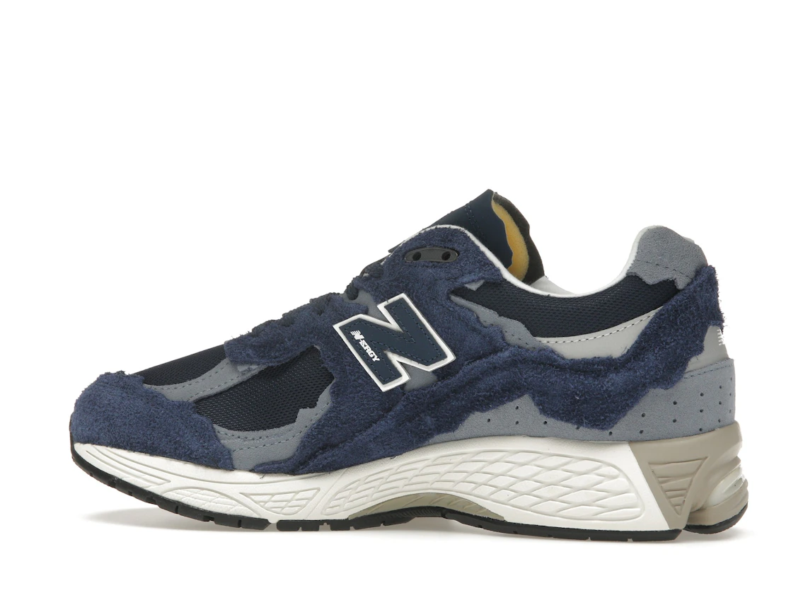Vue 21 de New Balance 2002R Protection Pack Navy Grey