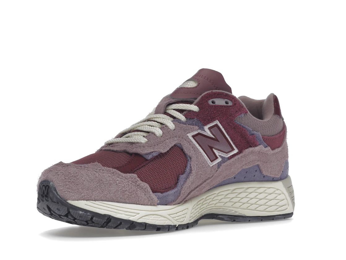 Vue 15 de New Balance 2002R Protection Pack Pink